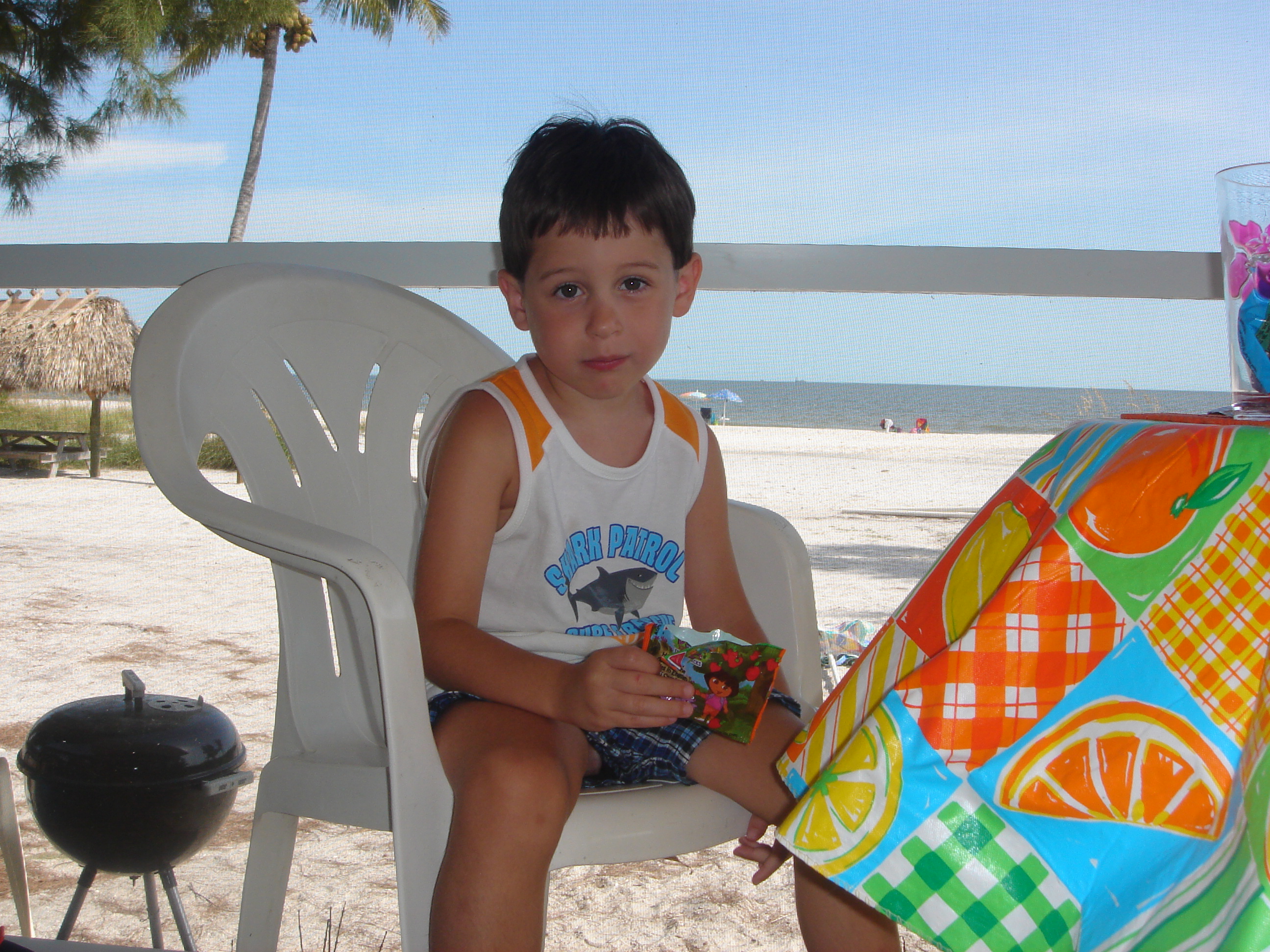 this 4-year old's look is as if i had said, "Only 7 more years and we'll get a pool" sanibel