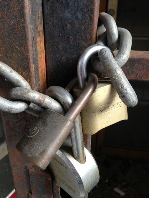 photo of one door with three locks