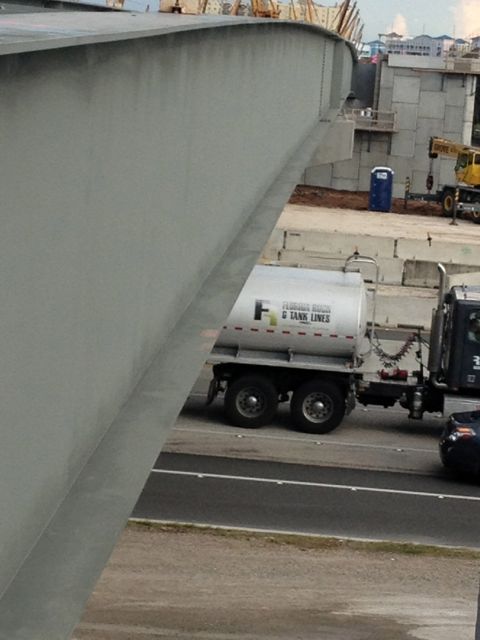 notice the port-a-potty across the way... the I-beams are easily six feet tall Bridge I beams