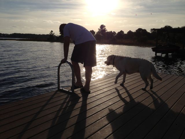 photo of Florida life on a lake dock at sunset
