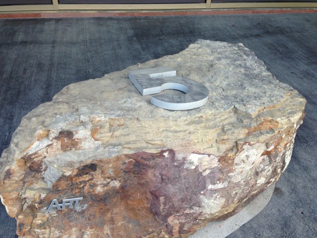 large rock with large with large silver number 5 on it