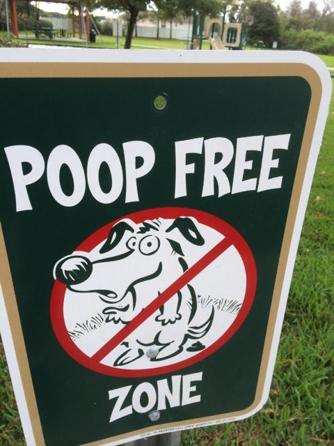 No dogs allowed to poop sign
