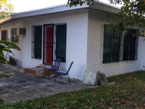 Miami Beach house with security gates over windows and doors