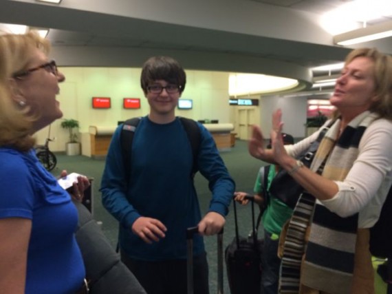 Airport luggage claim greeting in Orlando