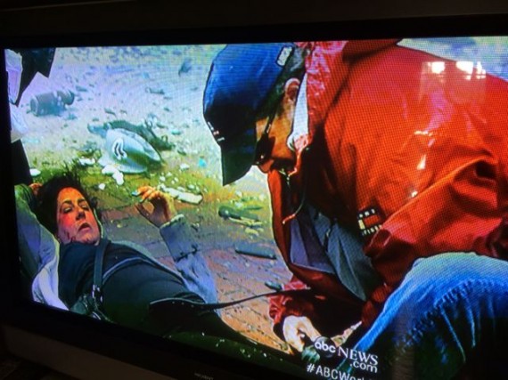 Boston Marathon bombing - husband helping wife who lost both legs