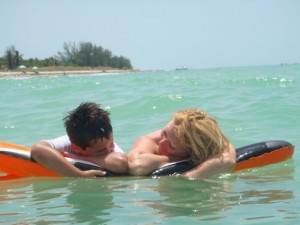 Mom and son floating in Gulf of Mexico at Sanibel Island