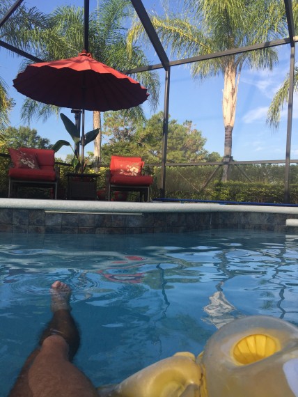 Relaxing on a pool raft