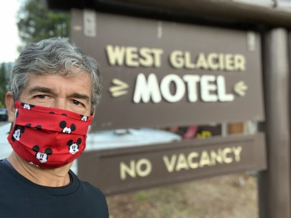 Disney speaker jeffnoel and Mickey Mouse mask at motel sign