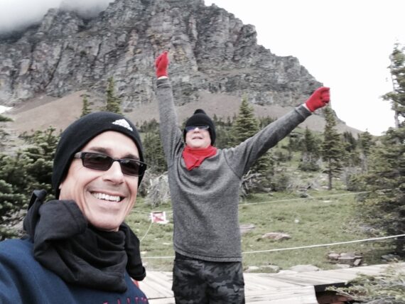 Father and son on a hike in the mountains