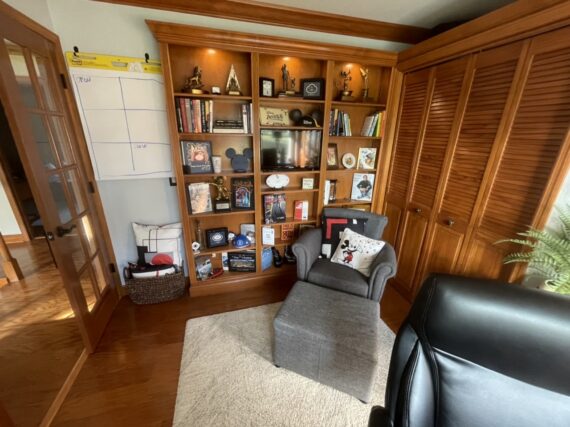Home office with wooden bookshelf