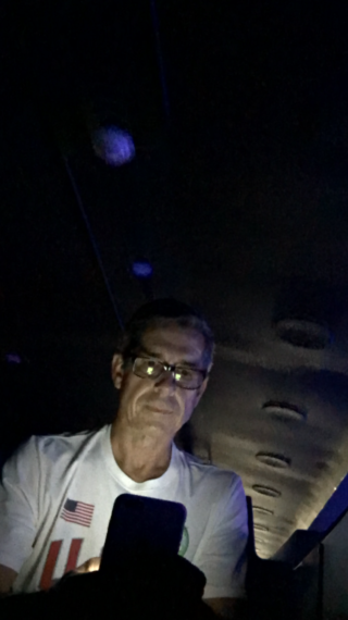 Writing while traveling on the Tomorrowland Transit Authority's PeopleMover.