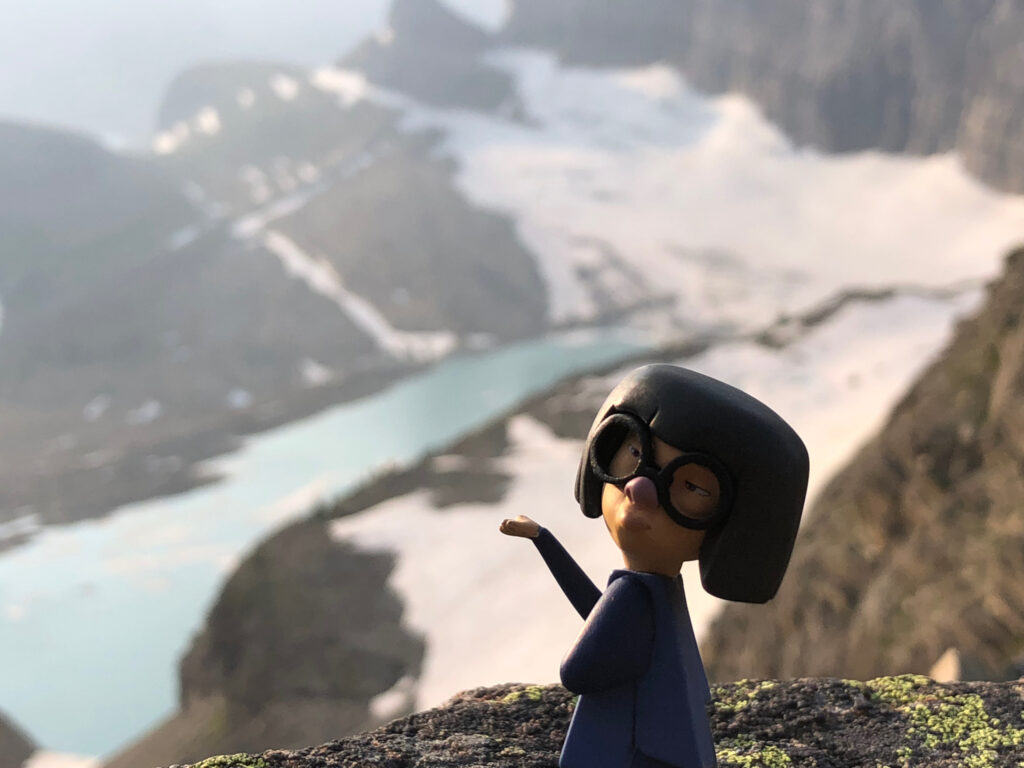 Edna Mode toy in mountains