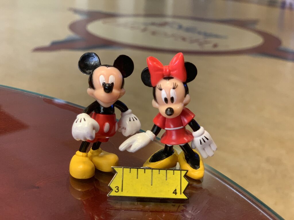 Mickey and Minnie Mouse small plastic toys at Disney University 