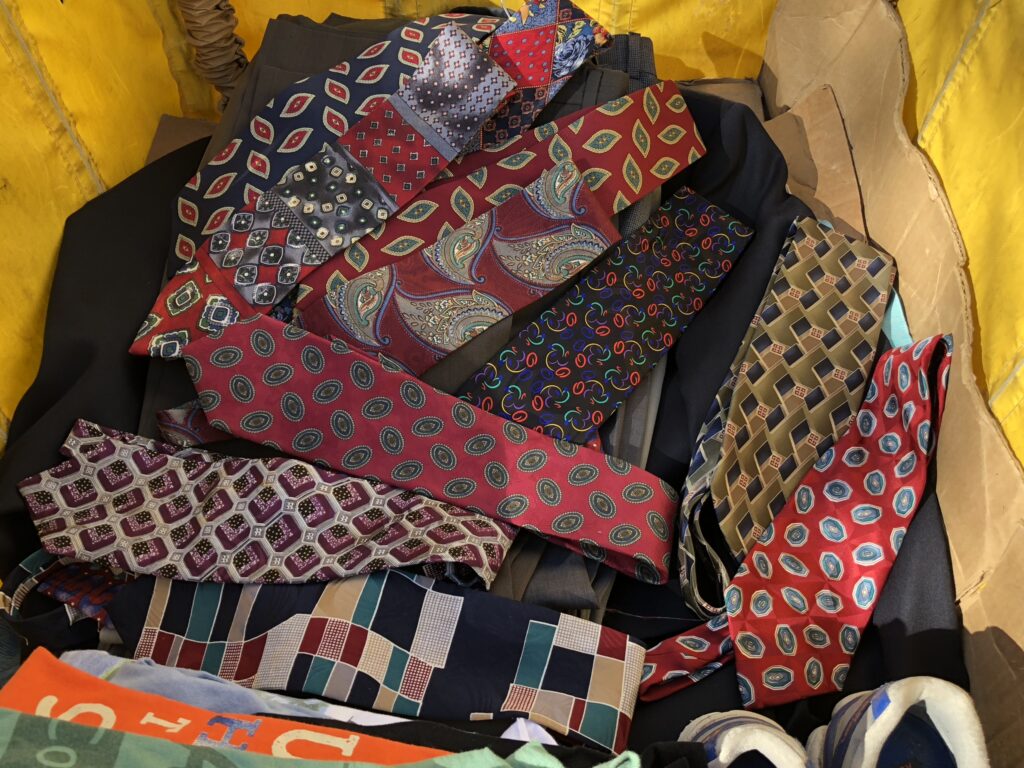 Box full of neck ties