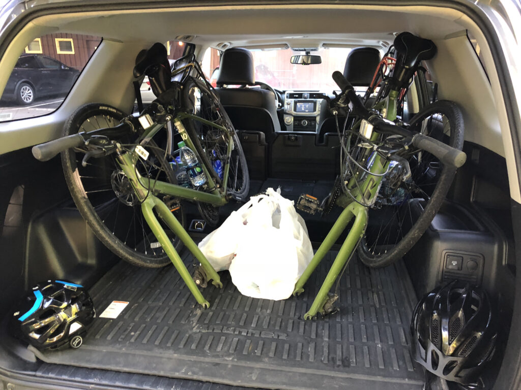 two bicycles in an SUV