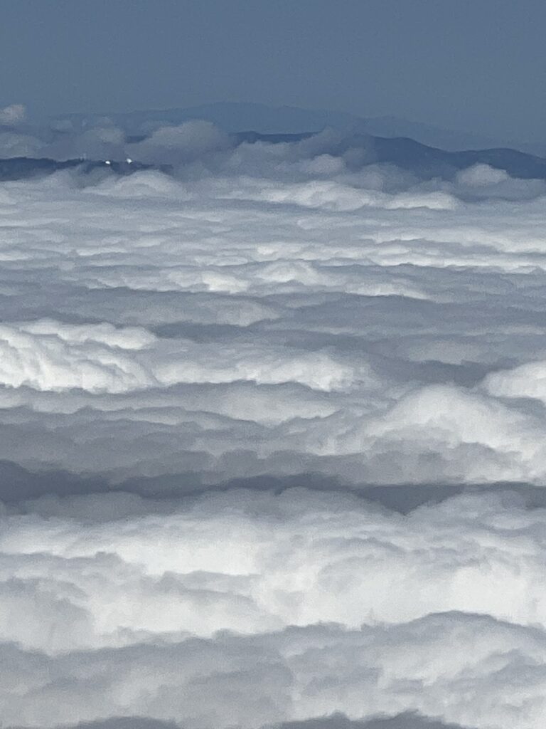 clouds and mountains from a jet