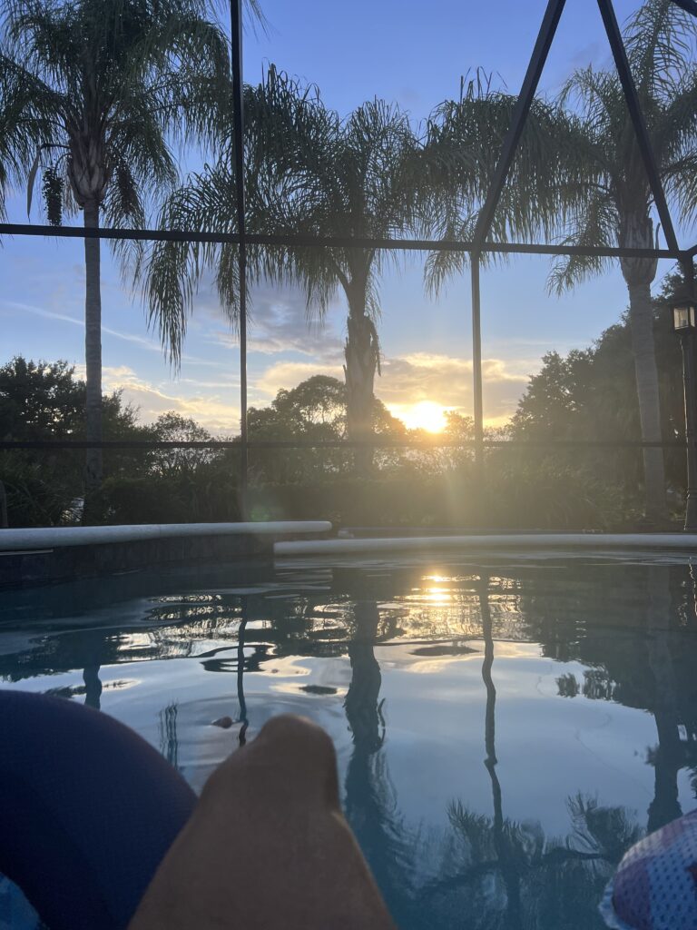Swimming pool at sunset