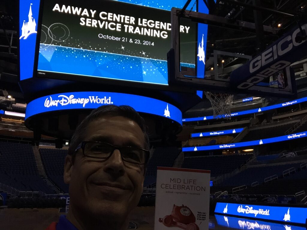 Disney speaker Jeff Noel with his book at Orlando Magic Arena