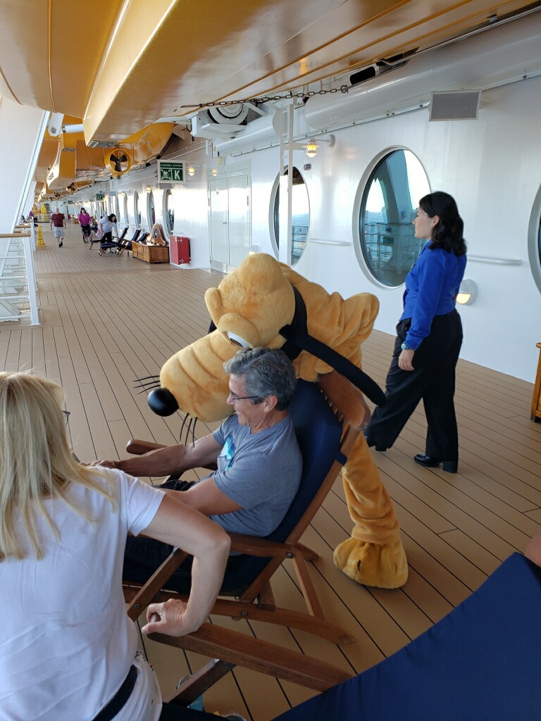 Disney character interacting with the cruise ship guests